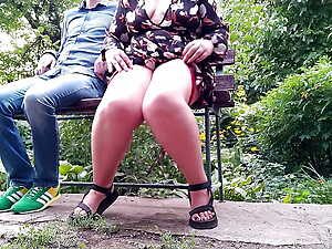 Slutty mother-in-law spreads her legs wide to pee in a public park